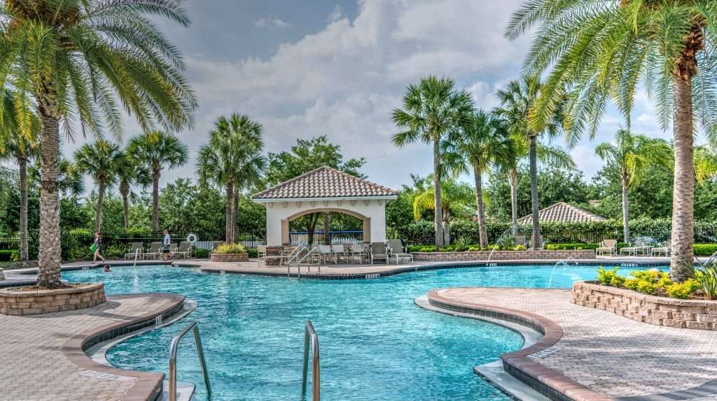 If you’re visiting a tropical destination or a place with a pool, make sure you take a plunge because swimming is an excellent workout for the whole body.